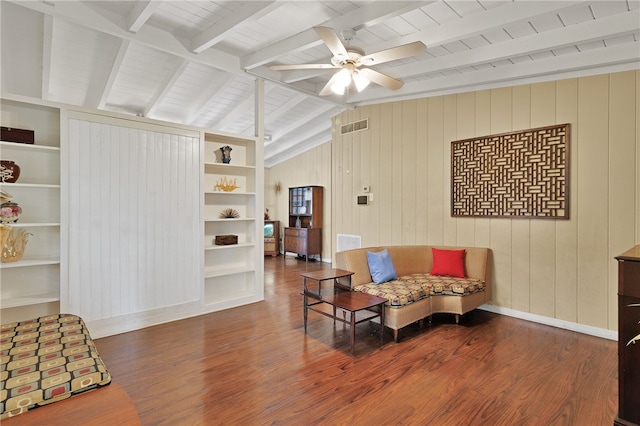 sitting room with dark wood-type flooring, vaulted ceiling with beams, wooden ceiling, and ceiling fan