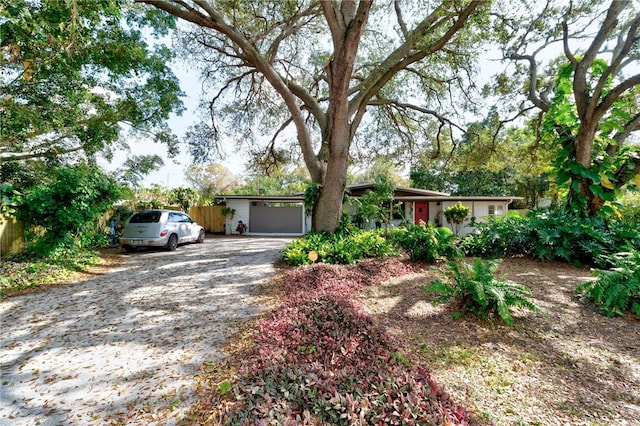 ranch-style home with a garage