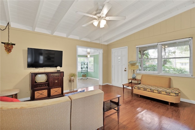 living room featuring wood ceiling, ceiling fan, wood-type flooring, and vaulted ceiling with beams