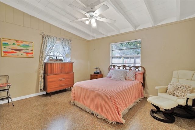 bedroom with ceiling fan and vaulted ceiling with beams