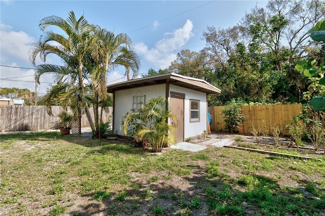 view of outdoor structure with a yard