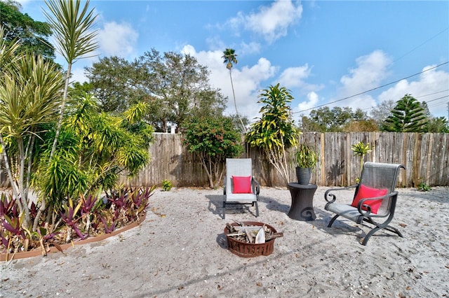 view of patio featuring a fire pit