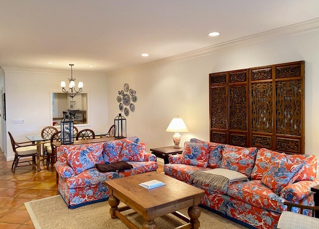 living room with light tile patterned floors, ornamental molding, and a notable chandelier