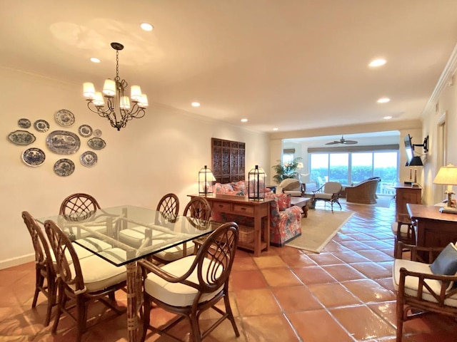 dining room with ceiling fan with notable chandelier, light tile patterned flooring, and crown molding