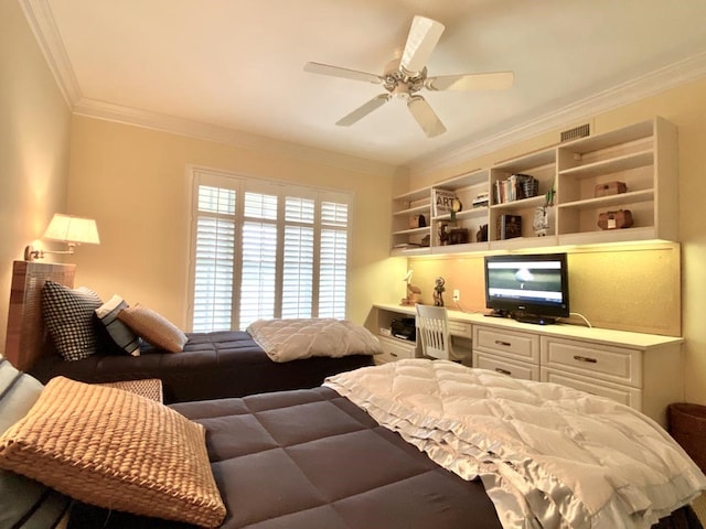 bedroom with built in desk, ceiling fan, and ornamental molding