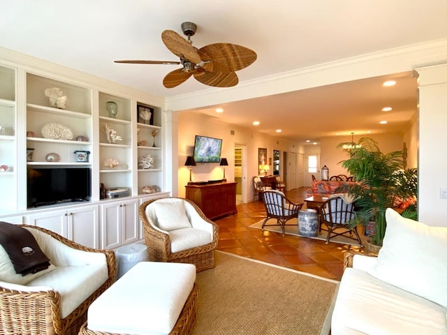 tiled living room with crown molding and ceiling fan