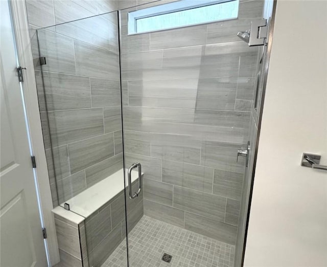 bathroom featuring a stall shower