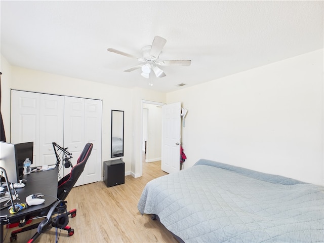 2297 Whiteside Ave SE, Palm Bay, FL 32909 - bedroom featuring visible vents, a closet, baseboards, ceiling fan, and light wood-style flooring