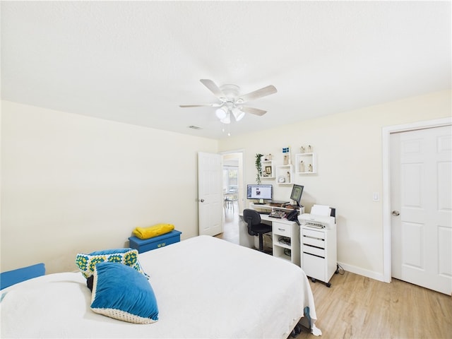 2297 Whiteside Ave SE, Palm Bay, FL 32909 - bedroom with baseboards, ceiling fan, light wood-style flooring, and visible vents