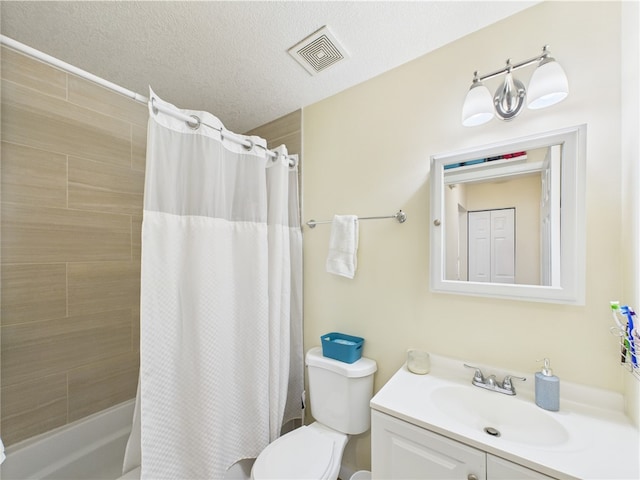 2297 Whiteside Ave SE, Palm Bay, FL 32909 - bathroom featuring a textured ceiling, visible vents, vanity, toilet, and shower / tub combo with curtain