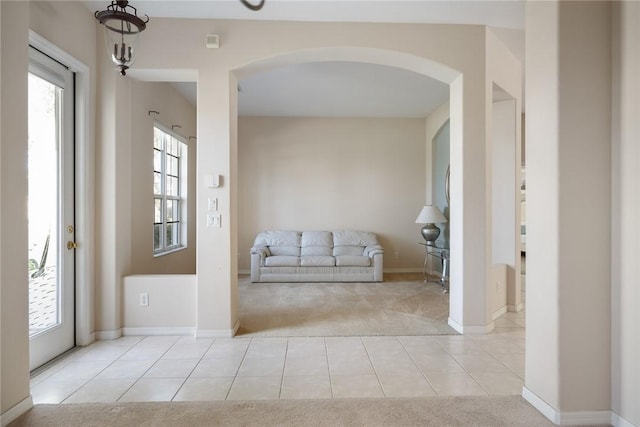 hallway with light carpet