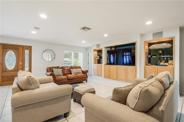 living room with light tile patterned flooring