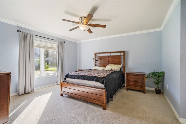 bedroom with ceiling fan, light carpet, and crown molding