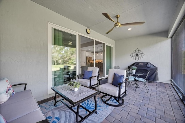 view of patio / terrace featuring an outdoor hangout area, area for grilling, and a ceiling fan