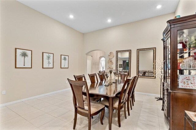 5744 Cahaba St, Port St Lucie, FL 34986 - dining room with arched walkways, light tile patterned floors, and recessed lighting