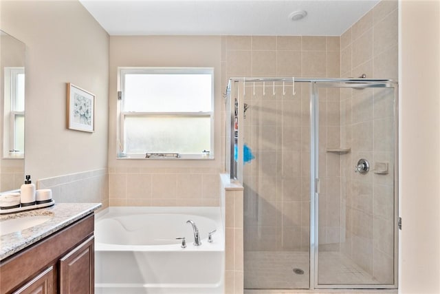 5744 Cahaba St, Port St Lucie, FL 34986 - full bath featuring vanity, a garden tub, and a shower stall