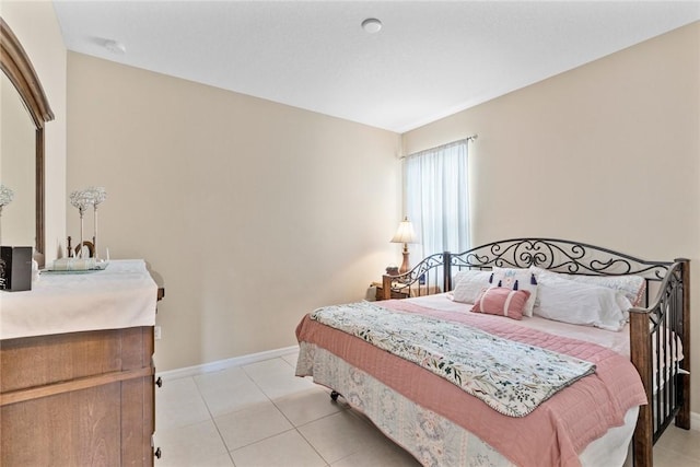 5744 Cahaba St, Port St Lucie, FL 34986 - bedroom with baseboards and light tile patterned floors