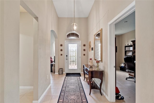 5744 Cahaba St, Port St Lucie, FL 34986 - entrance foyer featuring arched walkways and light tile patterned flooring