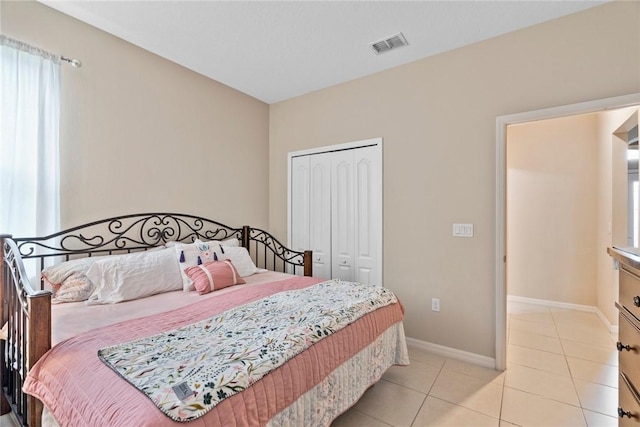 5744 Cahaba St, Port St Lucie, FL 34986 - bedroom with a closet and light tile patterned floors