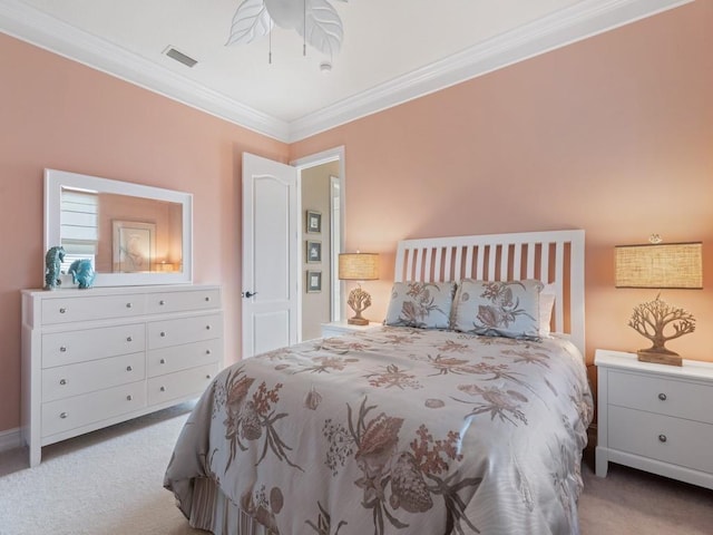 bedroom featuring light colored carpet and crown molding