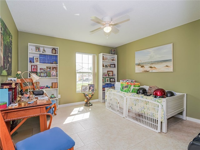 tiled bedroom featuring ceiling fan