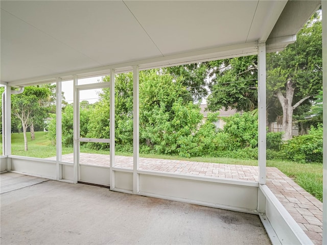 unfurnished sunroom with a healthy amount of sunlight