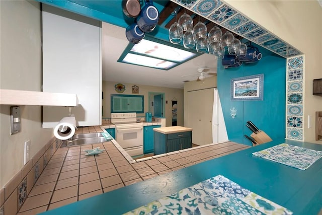 1514 Crowberry Ln, Sebastian, FL 32958 - bathroom featuring ceiling fan and tile patterned flooring