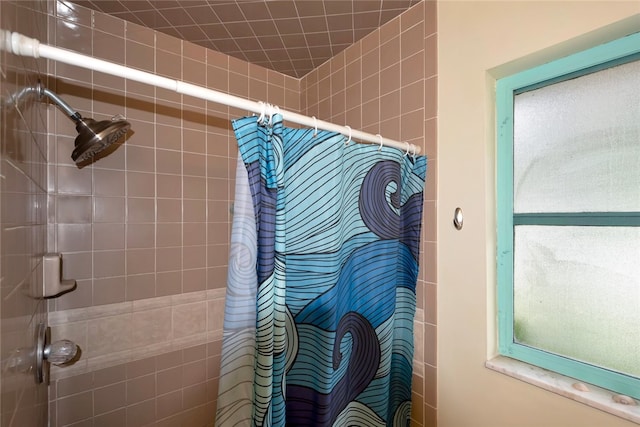 bathroom featuring a shower with curtain