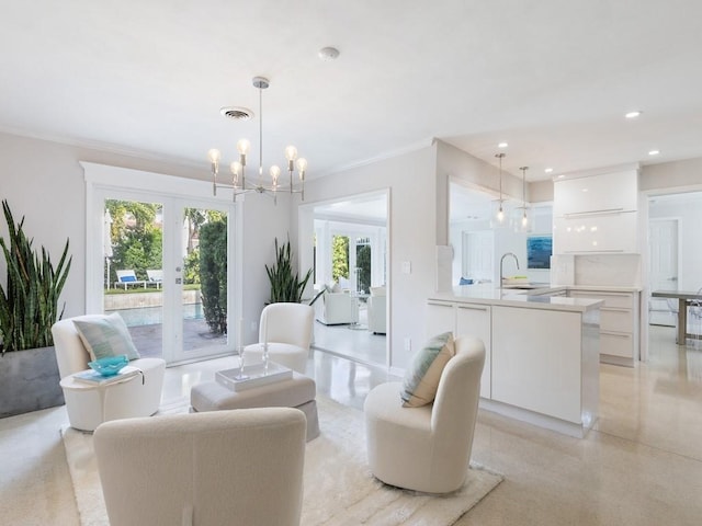 living room featuring recessed lighting, french doors, visible vents, and ornamental molding