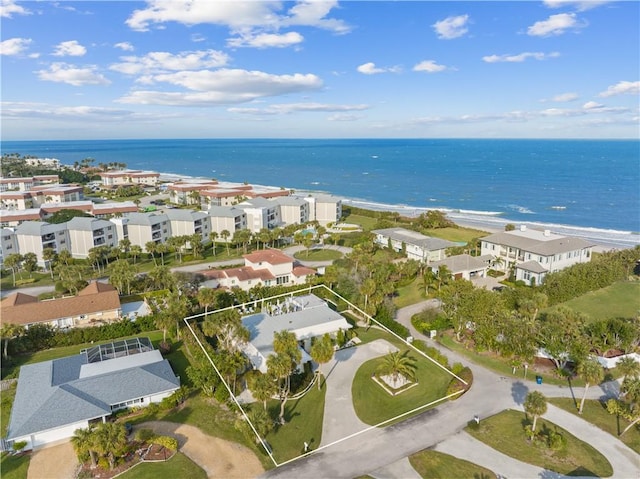 bird's eye view featuring a residential view and a water view