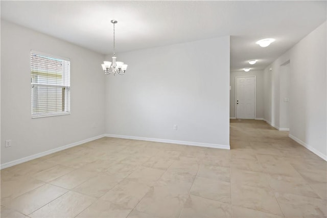 158 Port Royal Ct, Sebastian, FL 32958 - unfurnished room featuring a chandelier and baseboards