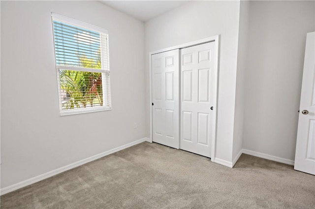 158 Port Royal Ct, Sebastian, FL 32958 - unfurnished bedroom featuring carpet floors and a closet