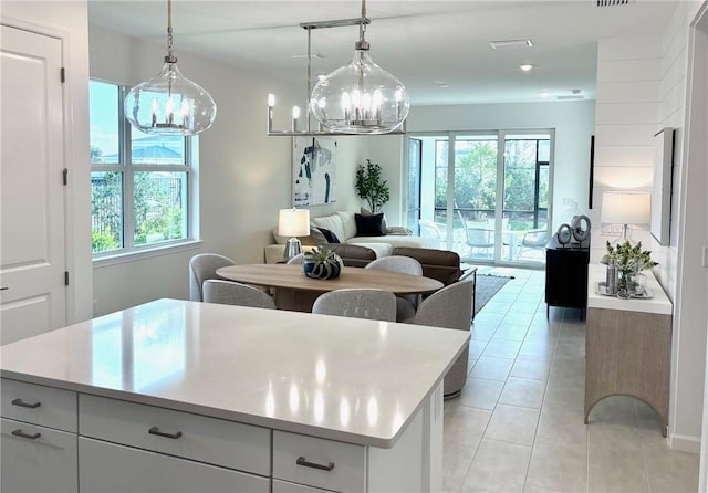 kitchen featuring a chandelier, plenty of natural light, and open floor plan