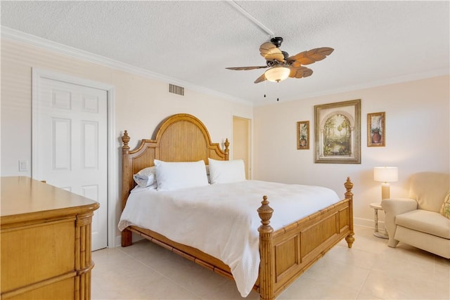 bedroom with a textured ceiling, ceiling fan, ornamental molding, and light tile patterned flooring