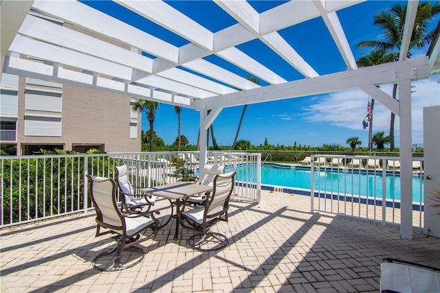 view of swimming pool with a pergola and a patio area