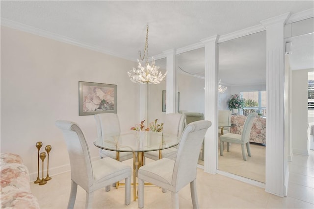 dining space featuring ornate columns, ornamental molding, and a chandelier