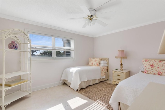 bedroom with ceiling fan, light tile patterned flooring, and crown molding