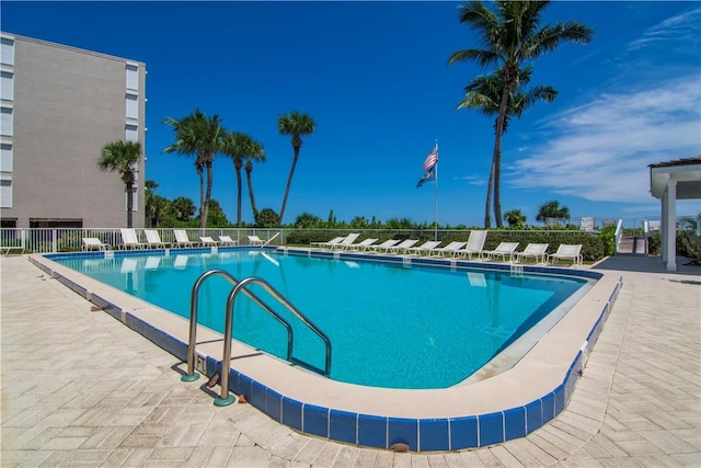 view of swimming pool featuring a patio