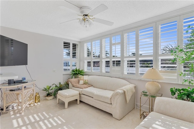 sunroom / solarium with ceiling fan