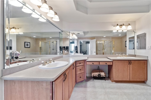 bathroom with vanity, tile patterned flooring, a shower with shower door, and a raised ceiling