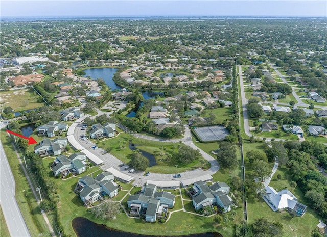 bird's eye view with a water view