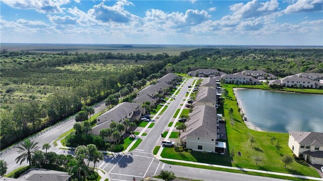 10011 W Villa Cir, Vero Beach, FL 32966 - aerial view of residential area with a large body of water and a forest