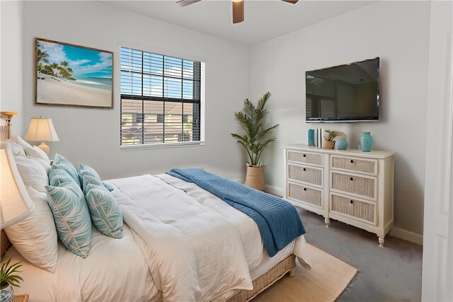 10011 W Villa Cir, Vero Beach, FL 32966 - carpeted bedroom with baseboards and a ceiling fan