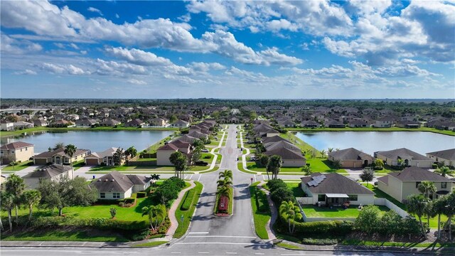 10011 W Villa Cir, Vero Beach, FL 32966 - aerial perspective of suburban area featuring a nearby body of water