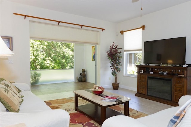 tiled living area with baseboards