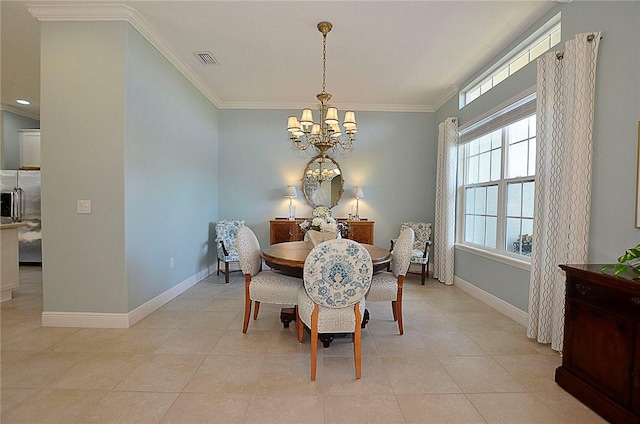 dining space with light tile patterned floors, crown molding, and a notable chandelier