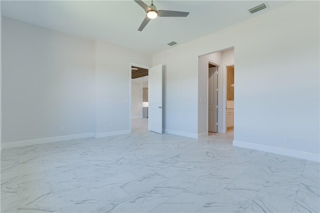 unfurnished bedroom with a ceiling fan, marble finish floor, visible vents, and baseboards