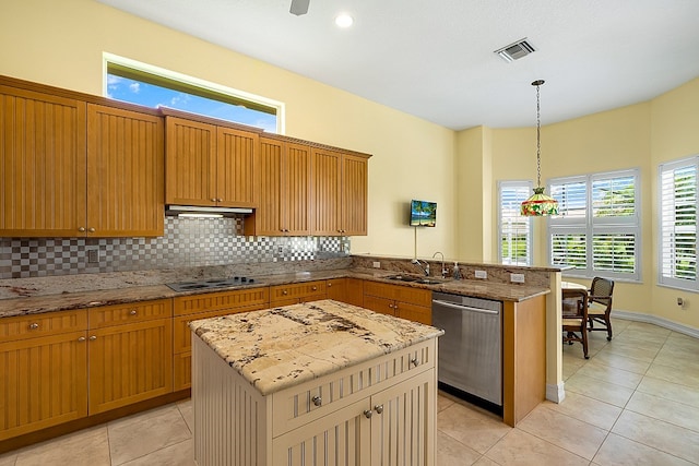 kitchen with tasteful backsplash, pendant lighting, stainless steel dishwasher, kitchen peninsula, and a center island