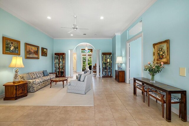 4336 Summer Breeze Ter, Vero Beach, FL 32967 - living room with arched walkways, a ceiling fan, ornamental molding, light tile patterned flooring, and recessed lighting