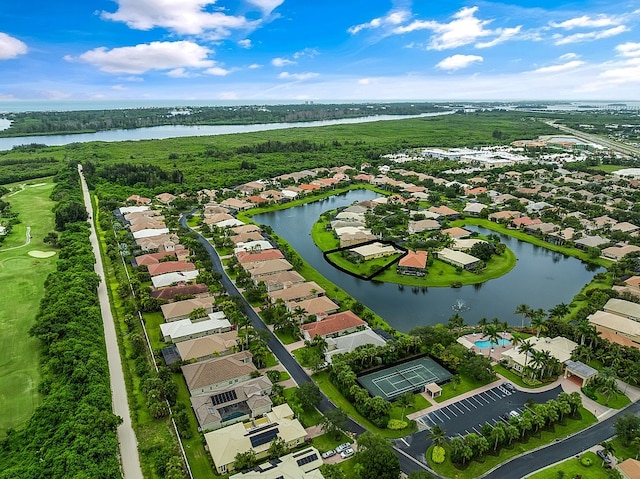 bird's eye view with a water view